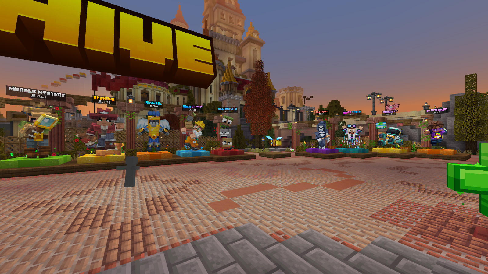 The Hive hub in Bedrock, with its large sign and labeled game characters.