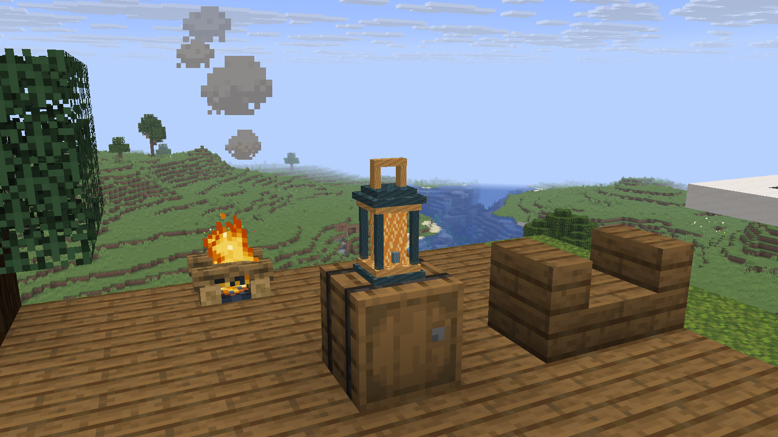 Our exported lantern model replaces a standing vanilla lantern beside a campfire in Java 26.2.