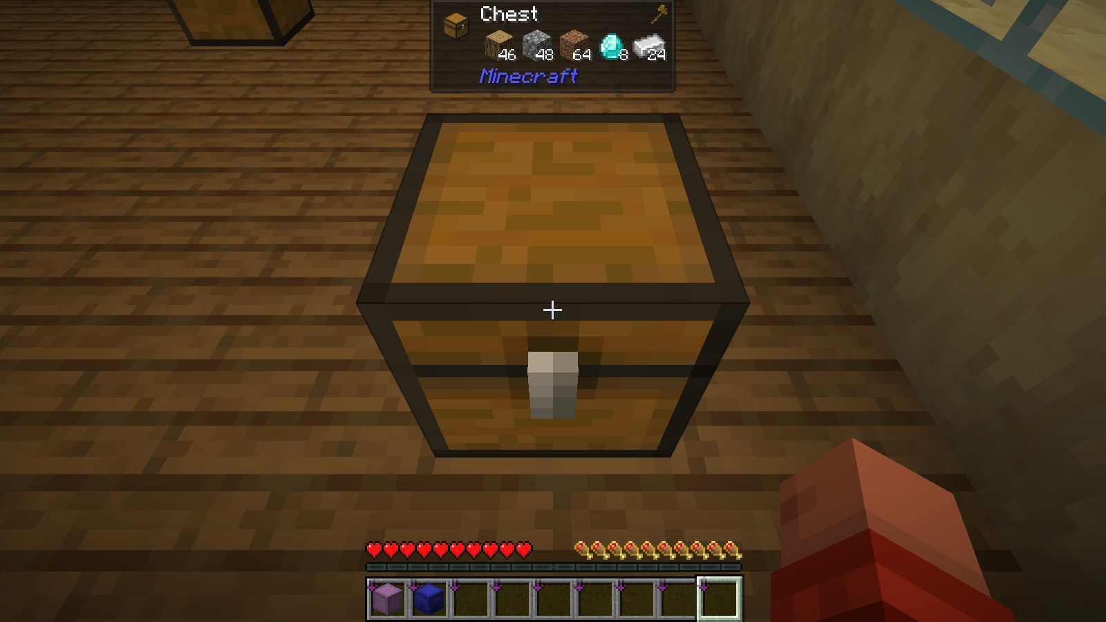 The chest placed four blocks farther across the workshop.