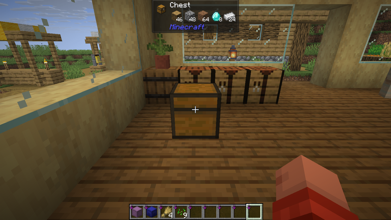 Jade displays the five stored material stacks while the chest stays closed.