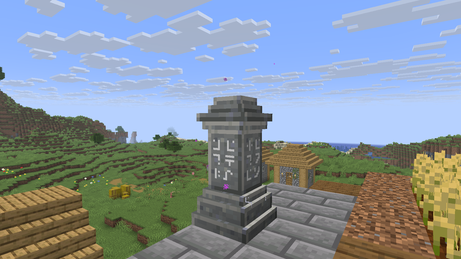 A waystone stands beside the Market Garden paths and crops.
