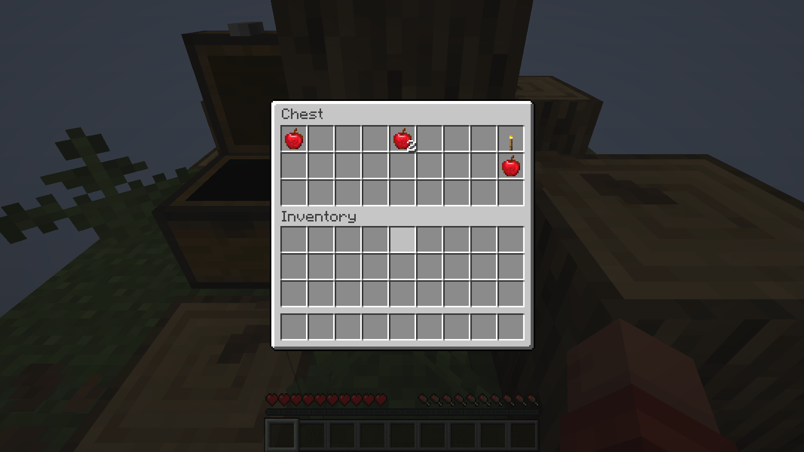 This first chest contains four apples and one torch; the items are still in the chest.