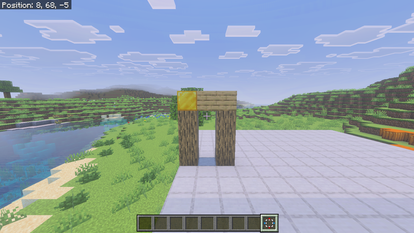 The oak-and-gold arch stands at the platform edge after the committed move, with clear space to its side.