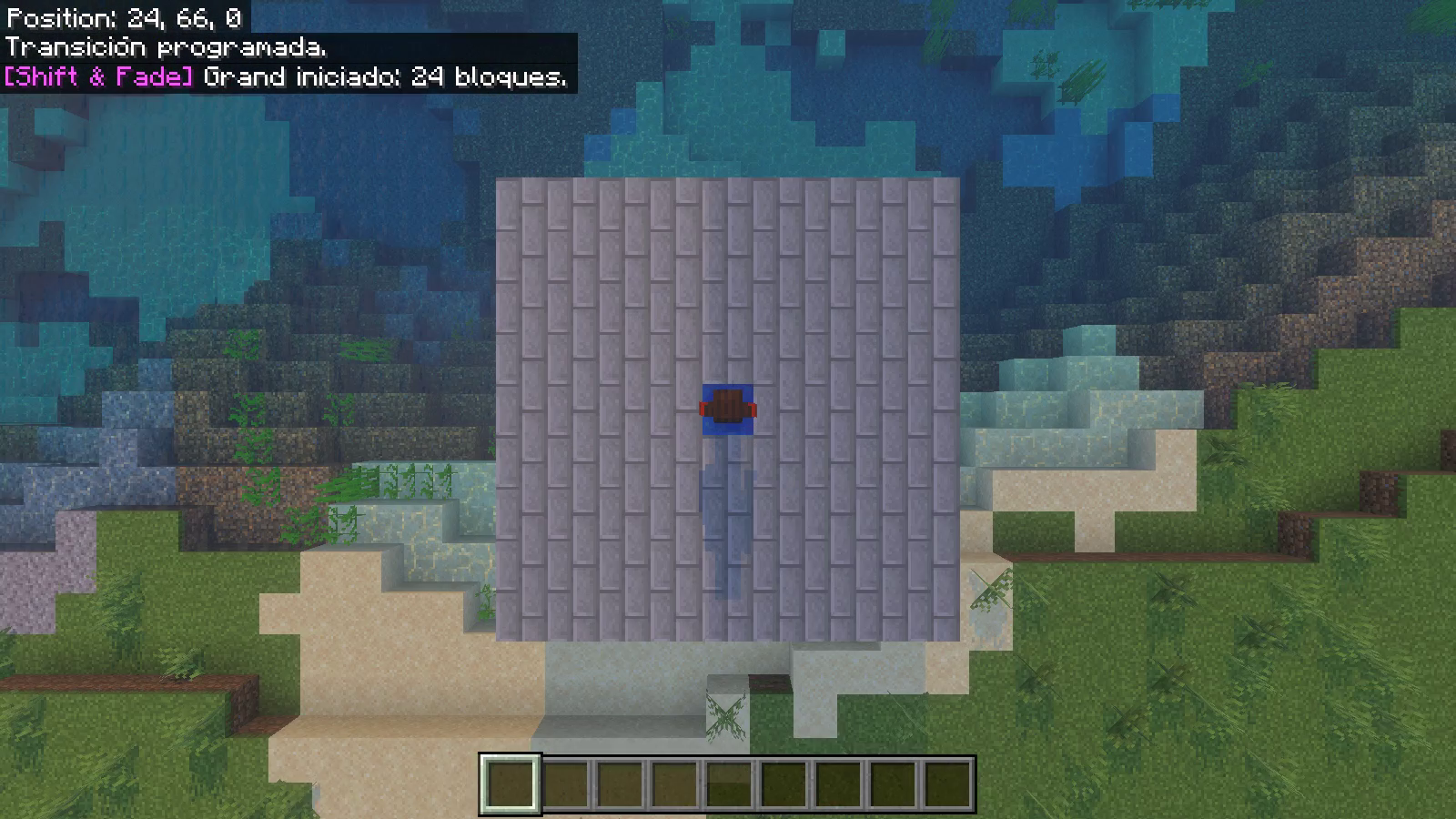 The player is visible over the blue destination block during Grand descent, with coordinates 24,66,0.