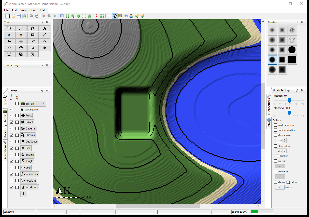 Close view of the grassy landing beside the harbor water, with contour lines and steep ground at its rear.