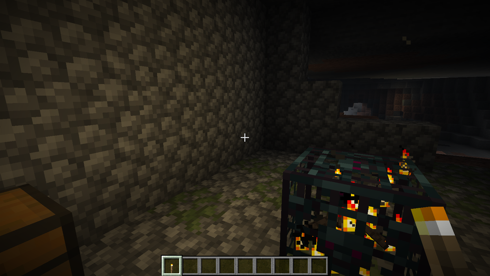 Holding the staged torch lights the nearby wall and floor through LambDynamicLights.