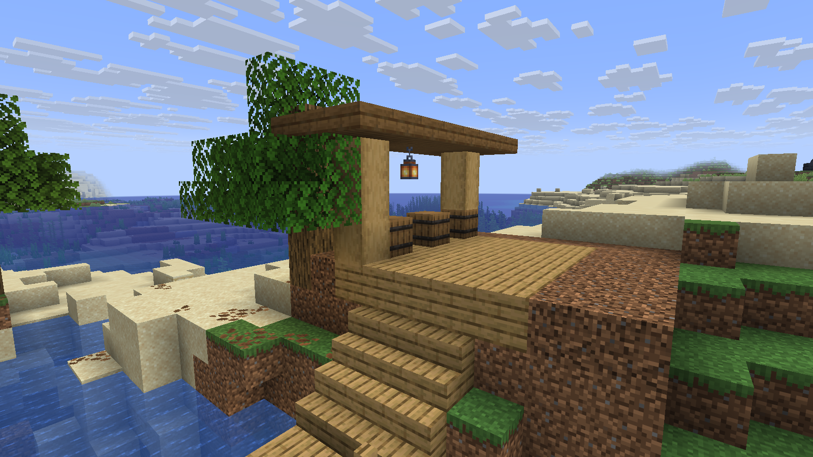 Barrels under the small riverside shelter.