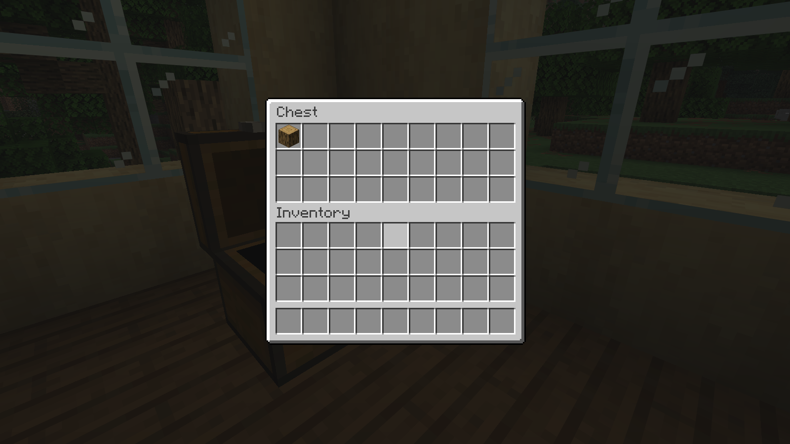 One staged oak log is placed into an empty workshop chest, then returned to the player inventory. Creative interaction check.