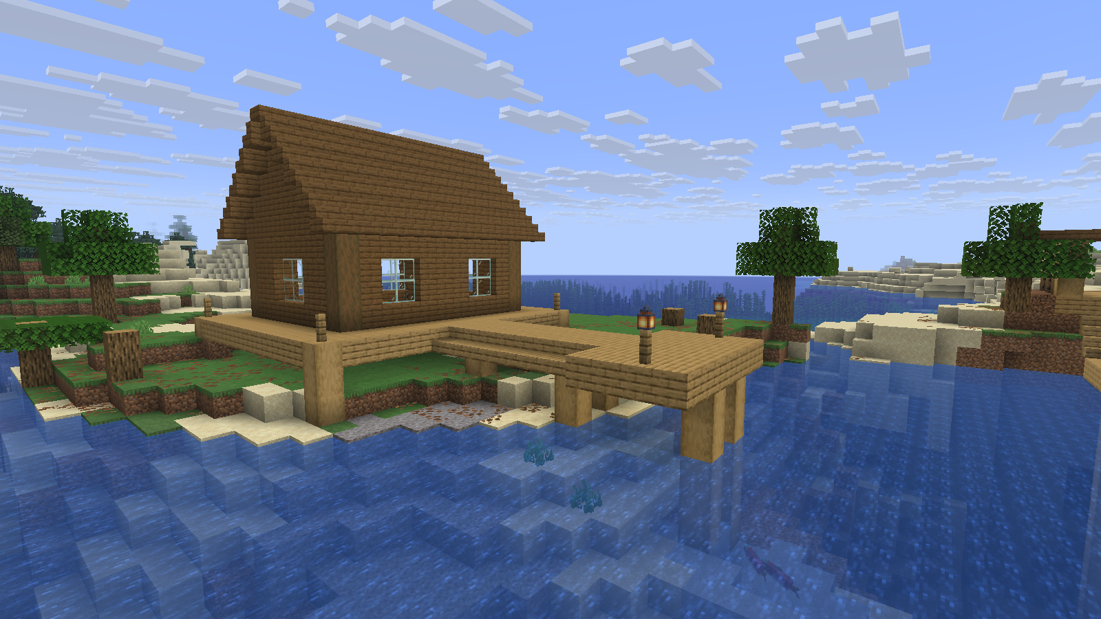 The landing and cabin share one raised timber deck. Adjust the supports to your own shoreline.