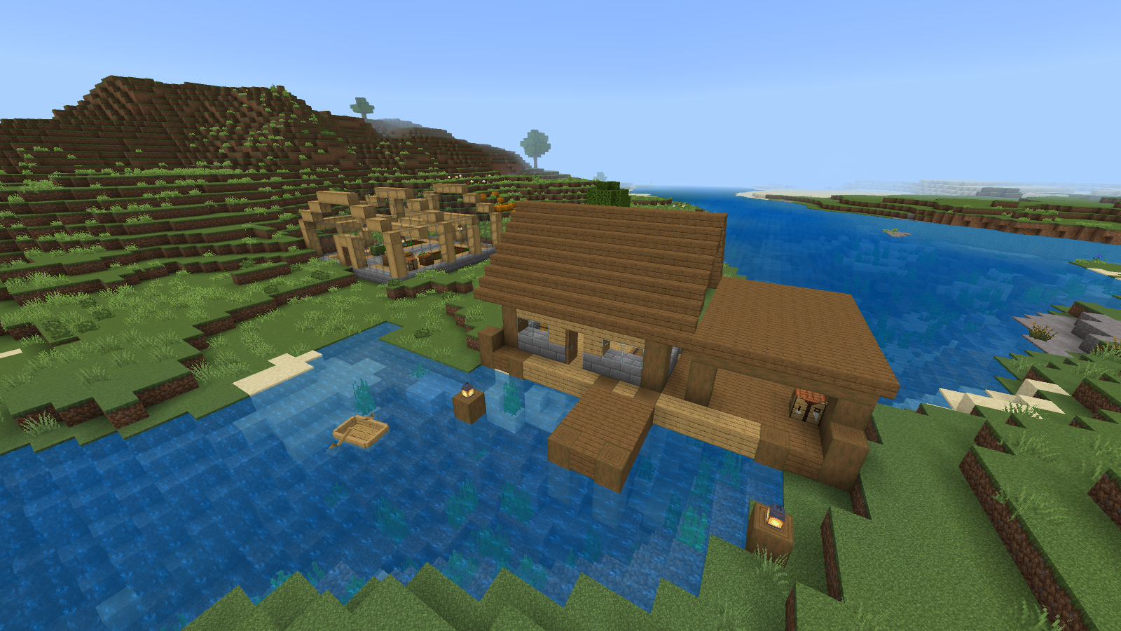 Timber river warehouse with a stone base and pier using Faithful 32x textures.