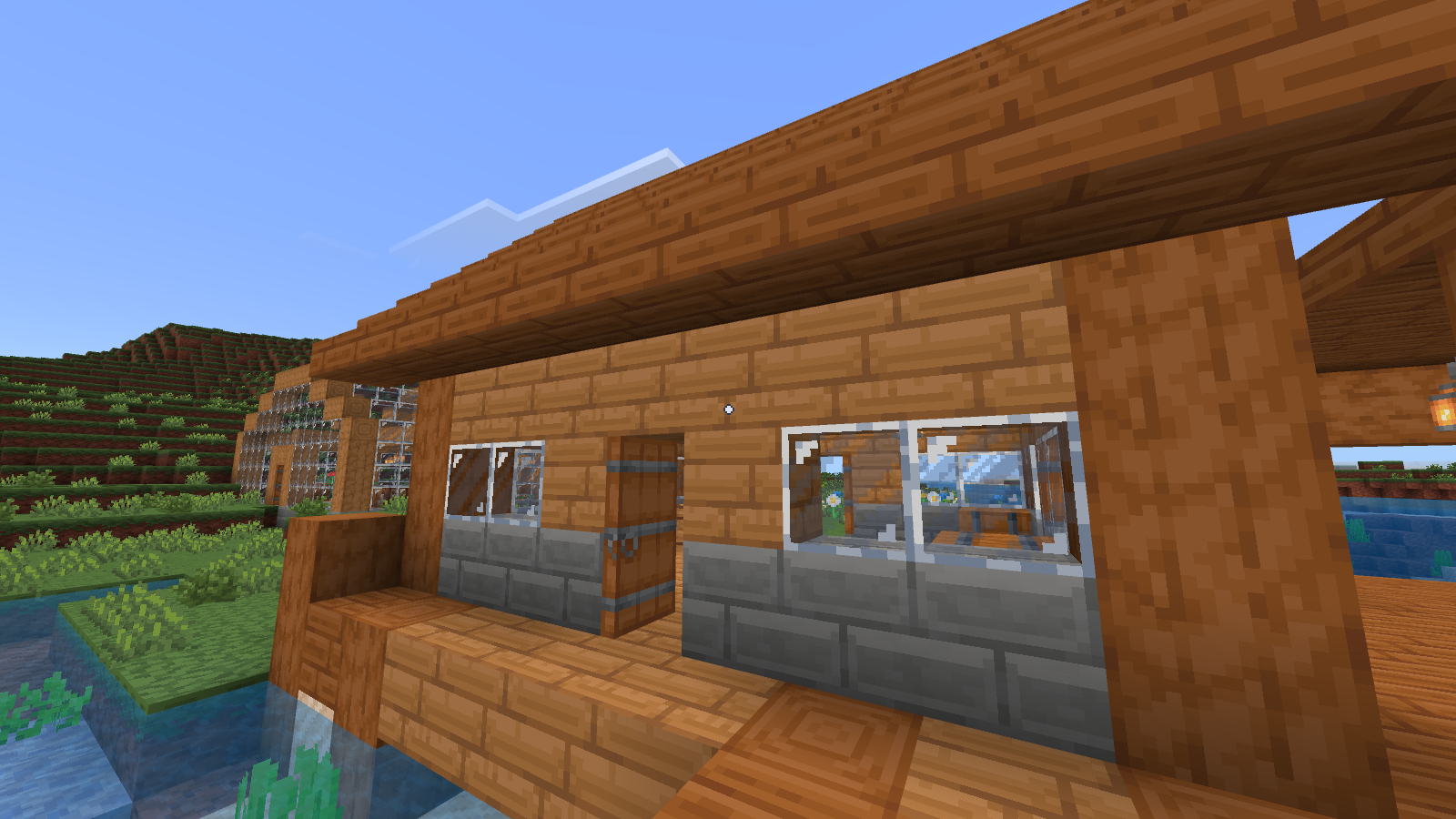 The same warehouse entrance using Devamped Legacy, showing warm wood and strong glass highlights.