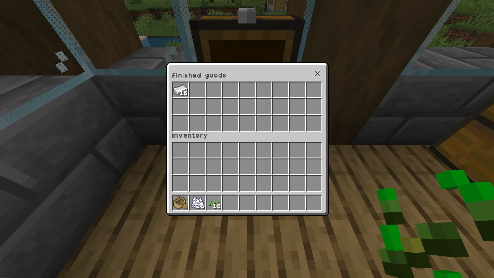 Finished goods chest with OpenDyslexic container and inventory labels and 16 iron ingots.