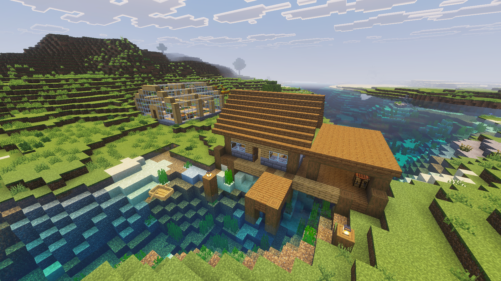 Wooden riverside warehouse and pier with Full Vanilla Vibrant Visuals active in daylight.