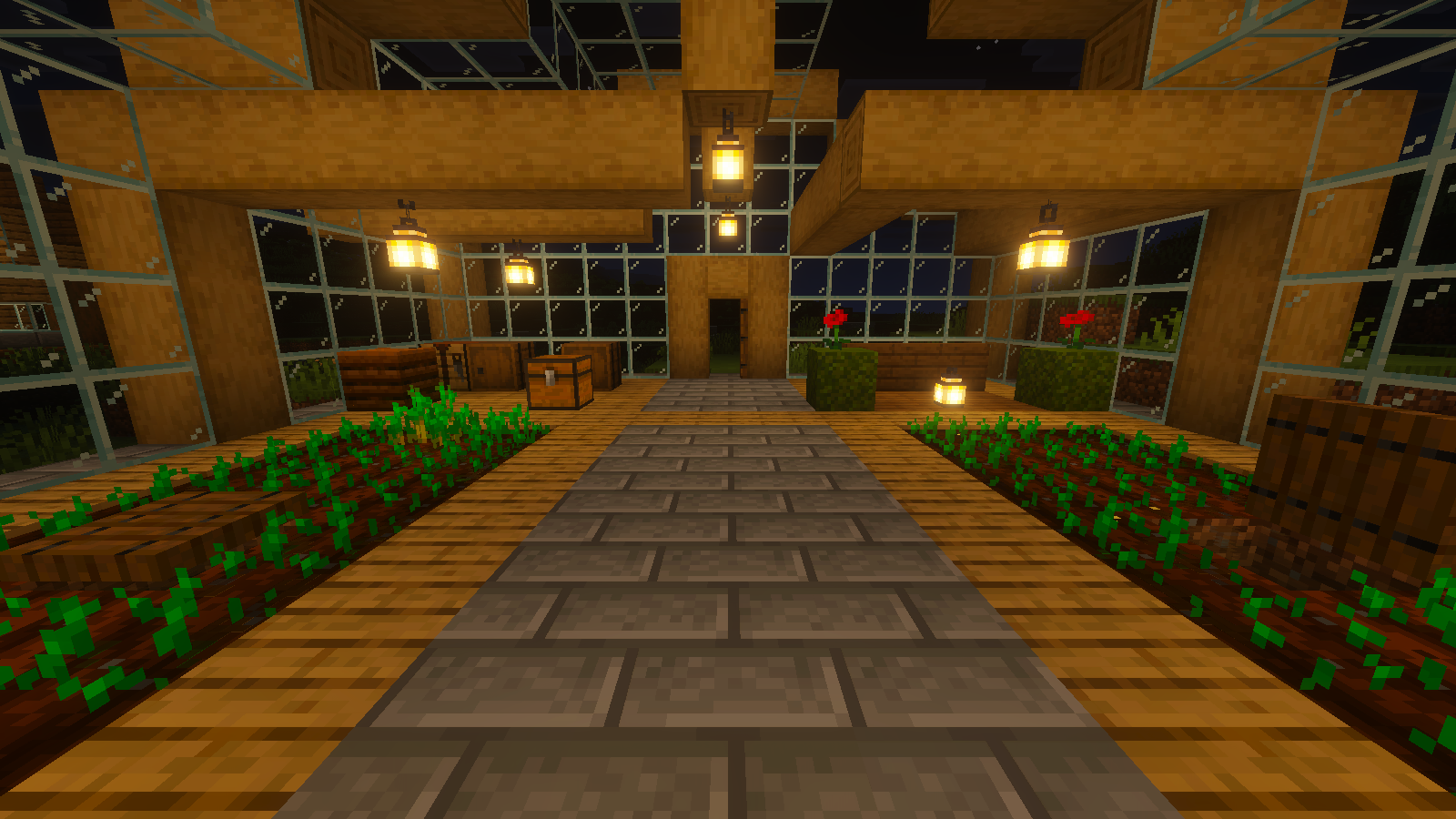 The same greenhouse after dark with brighter lanterns and warmer wood lighting from Full Vanilla Vibrant Visuals.