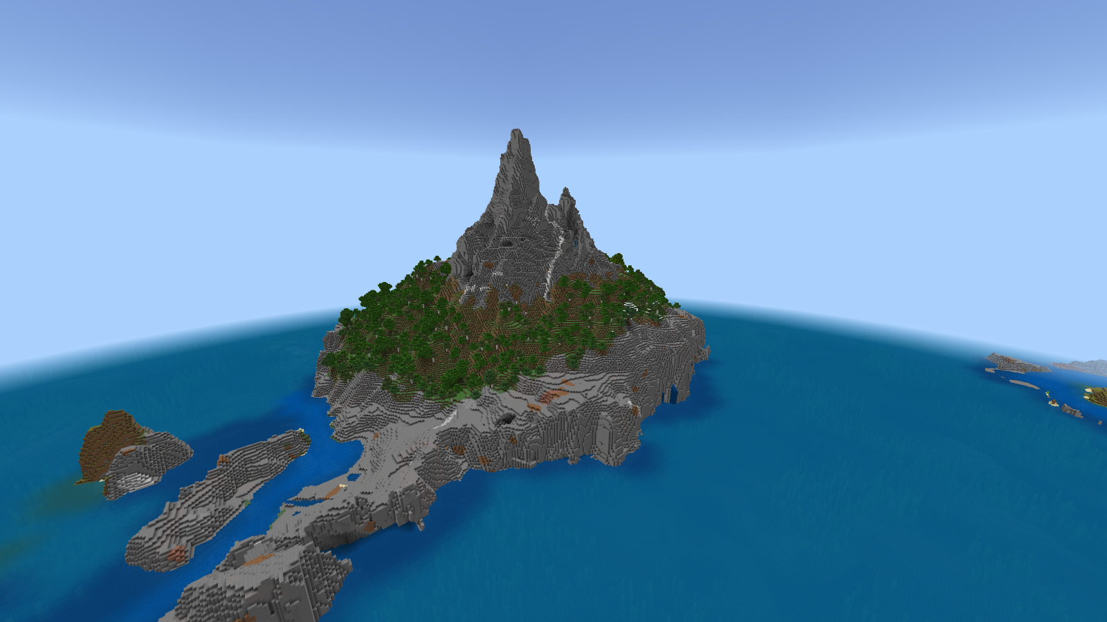 The opposite side of the mountain island, showing stone sea cliffs, forest above, a waterfall and nearby rocky islets.