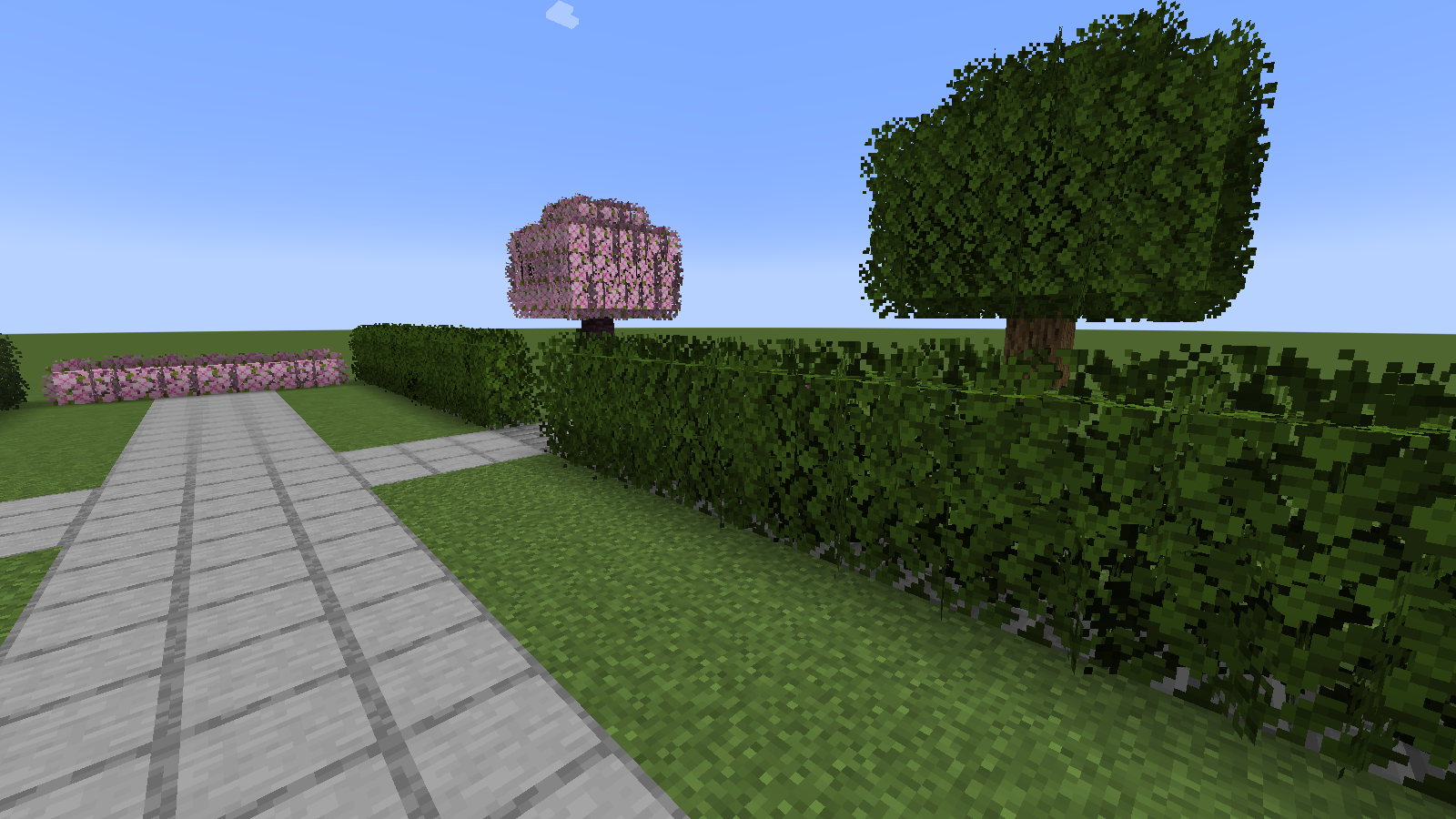 Better Leaves 9.6 adds leafy edges to the same oak hedge beside the unchanged garden path.