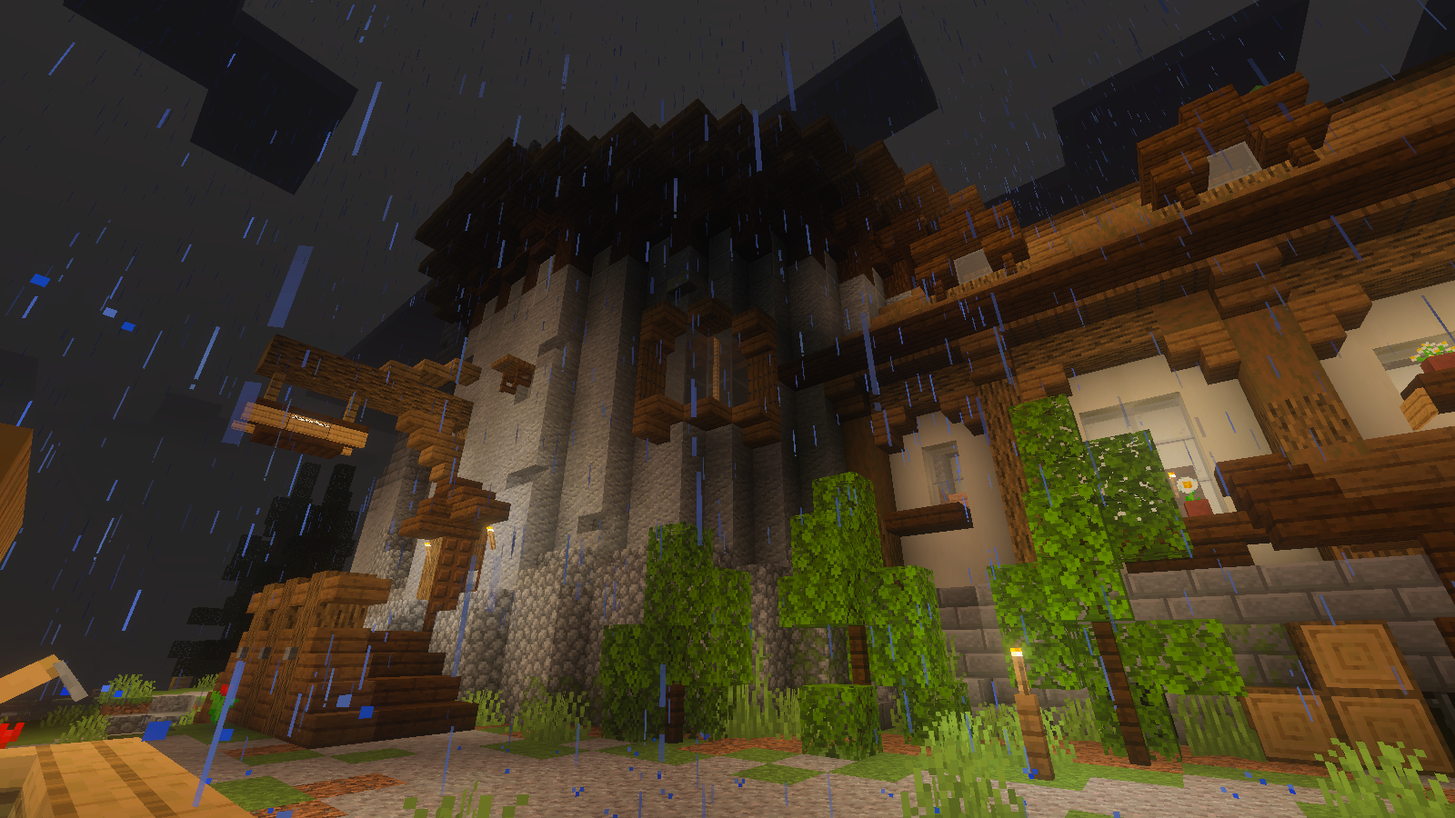 Gendry’s Tavern entrance and adjoining pale timber-framed facade in nighttime rain.
