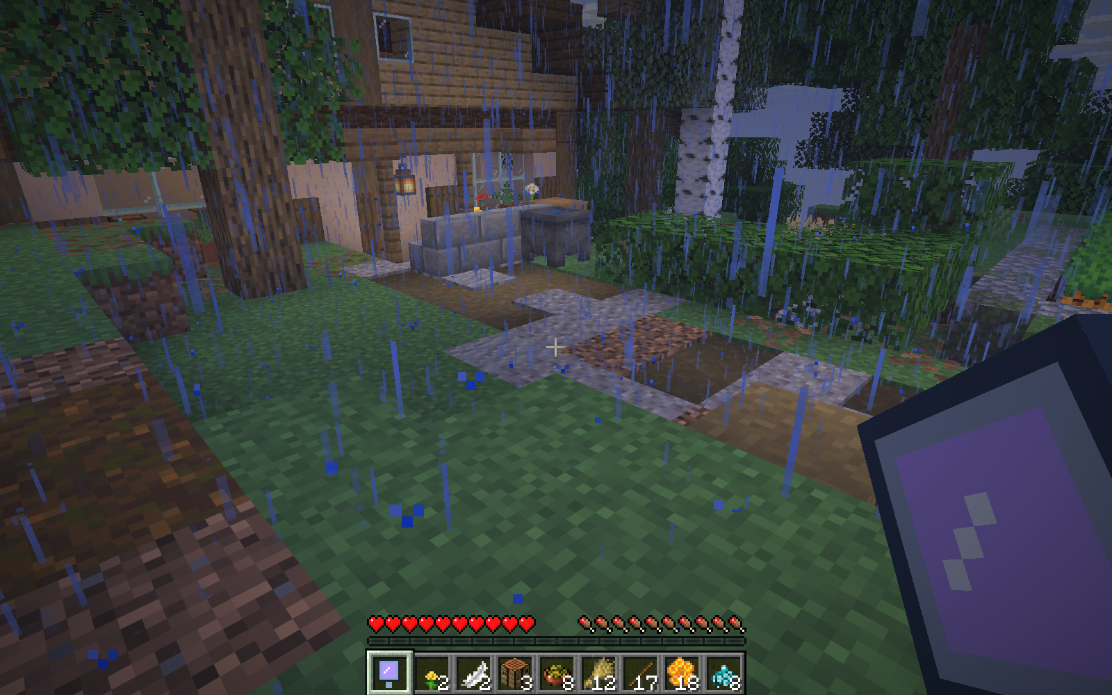 Empty building space beside the cottage before placing the mirrored stone posts.