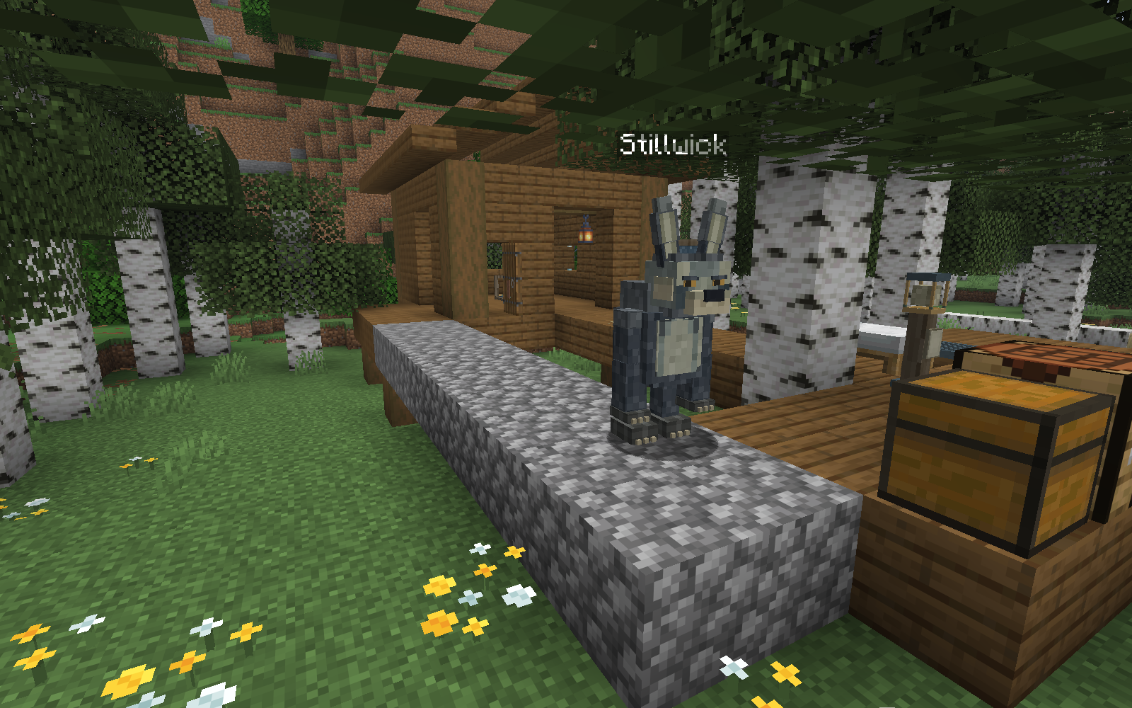 Stillwick with its long ears beside a wooden birch workshop and the Wayhome Light.