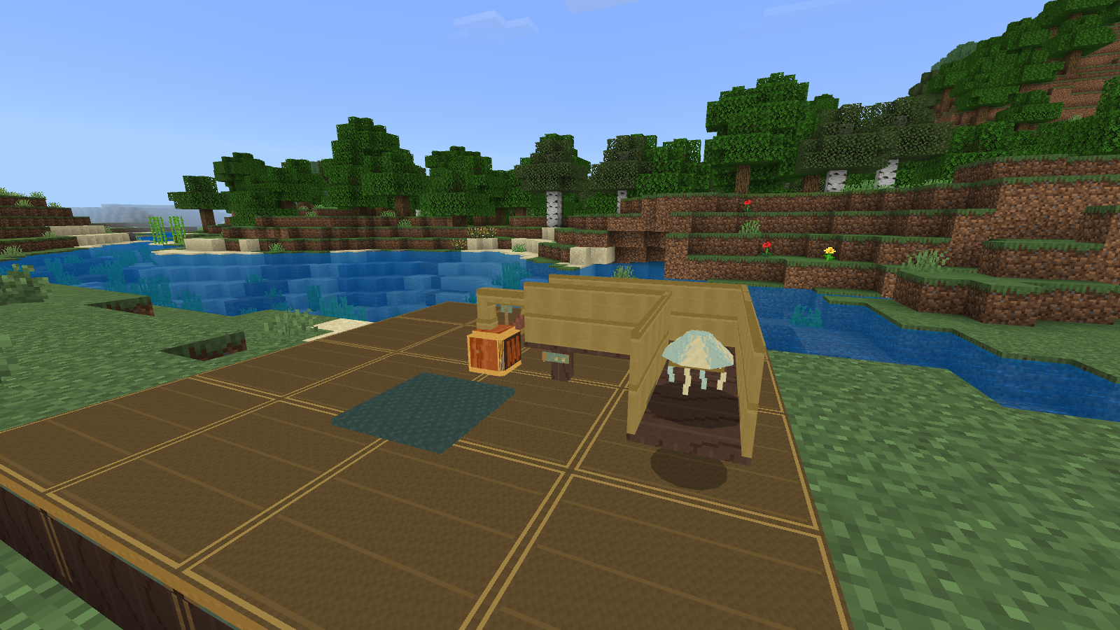 The Hollowreed tabletop and reed passages beside a river in Minecraft Bedrock.
