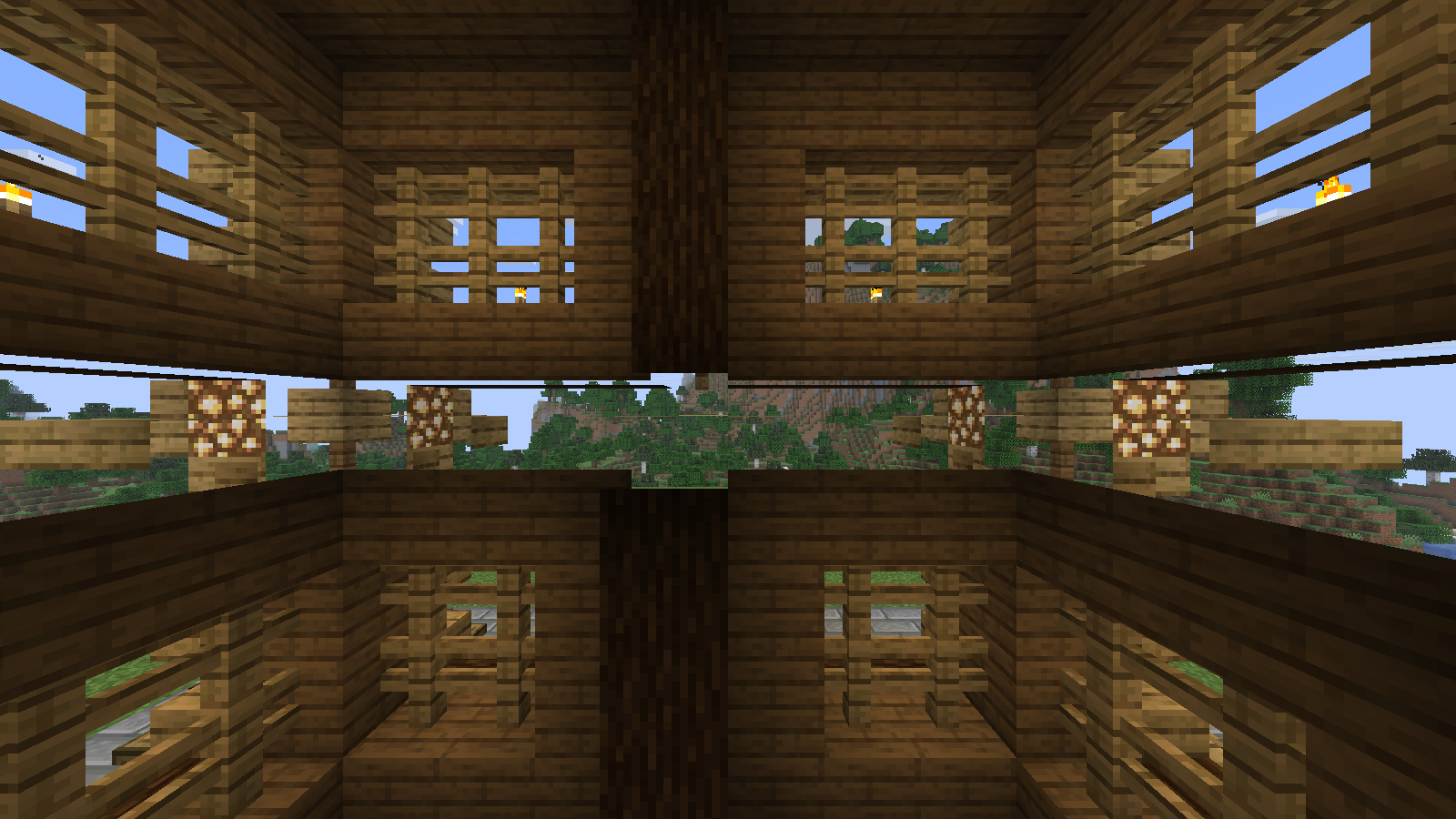 Open timber framing and glowstone lighting inside the imported Viking house.