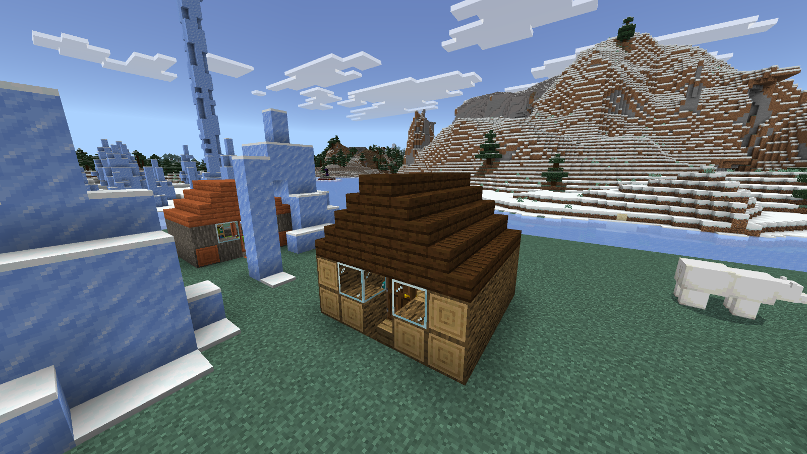 The imported house2 sample uses log ends, a dark roof and a compact front entrance.