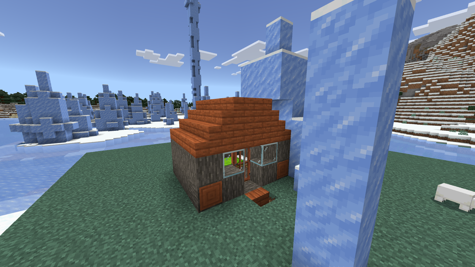 The imported house3 sample has an orange acacia roof, gray log walls and a small front step.