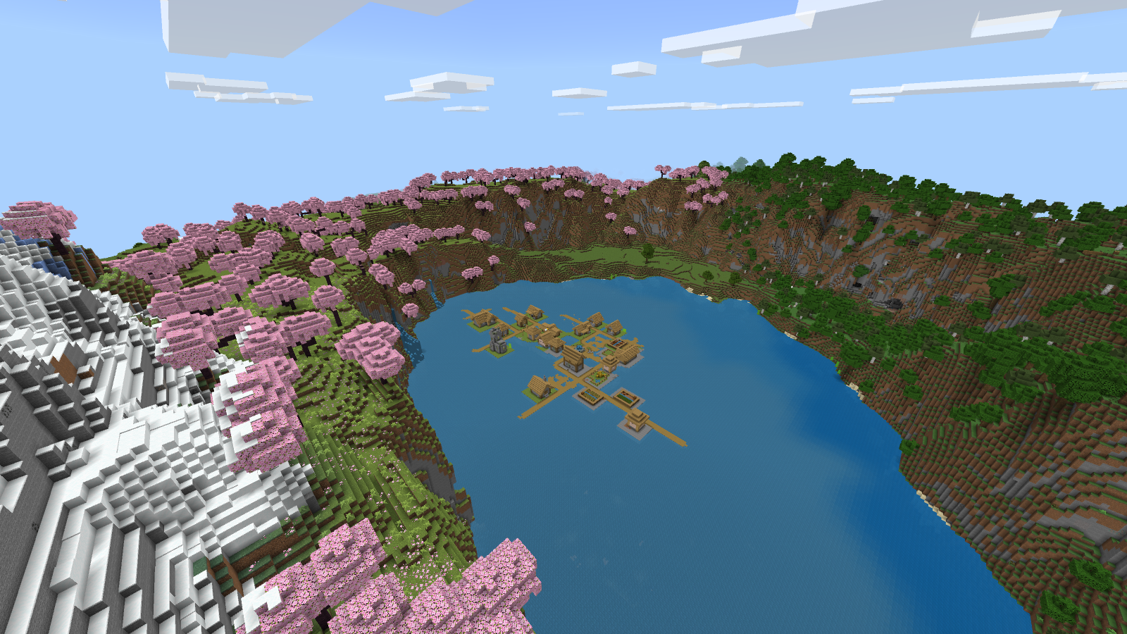A Bedrock lake village surrounded by cherry-covered cliffs and a snowy ridge on seed -1581708137743050235.