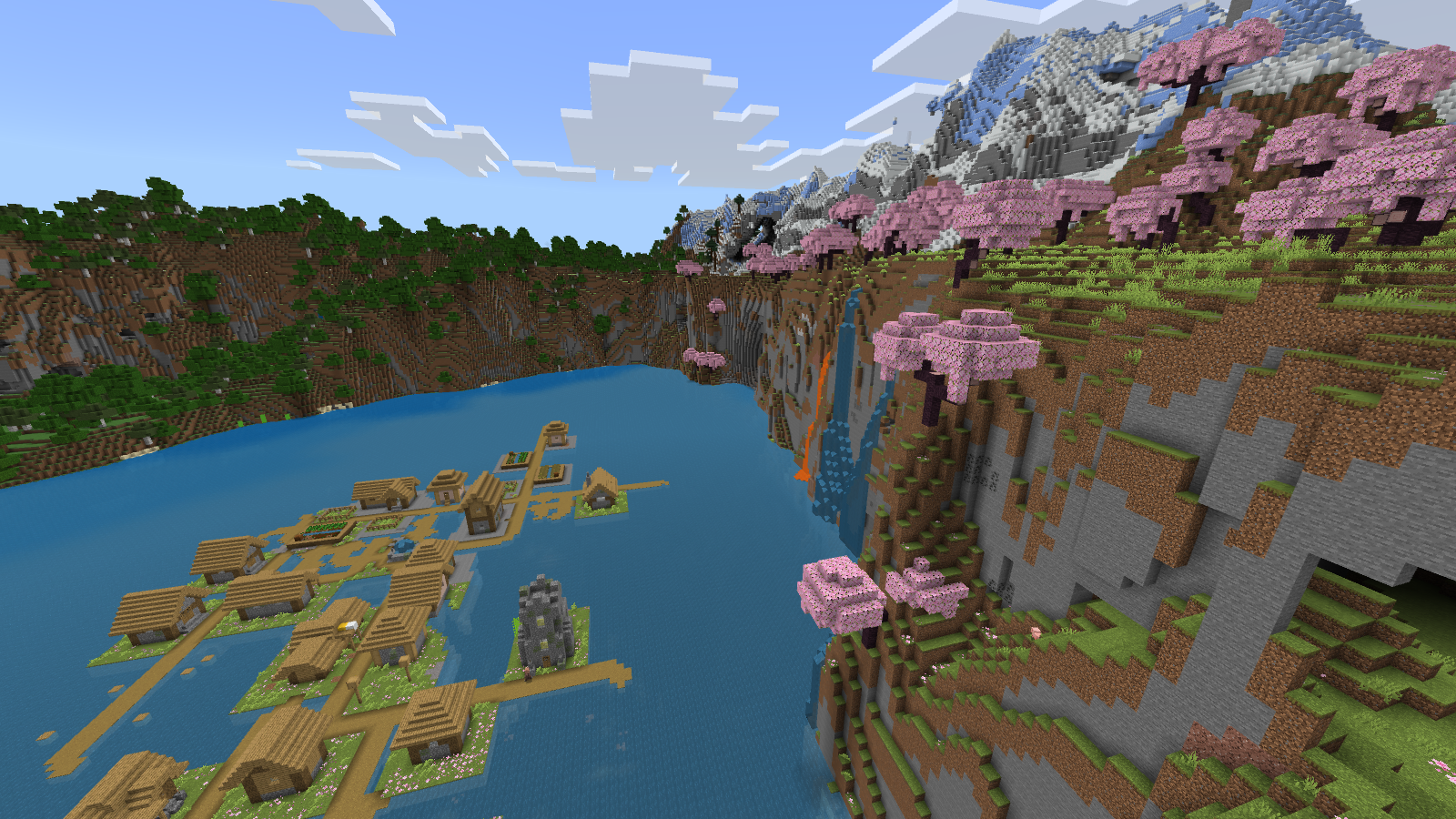 A waterfall and lava stream run down the cherry-covered cliff beside the lake village.