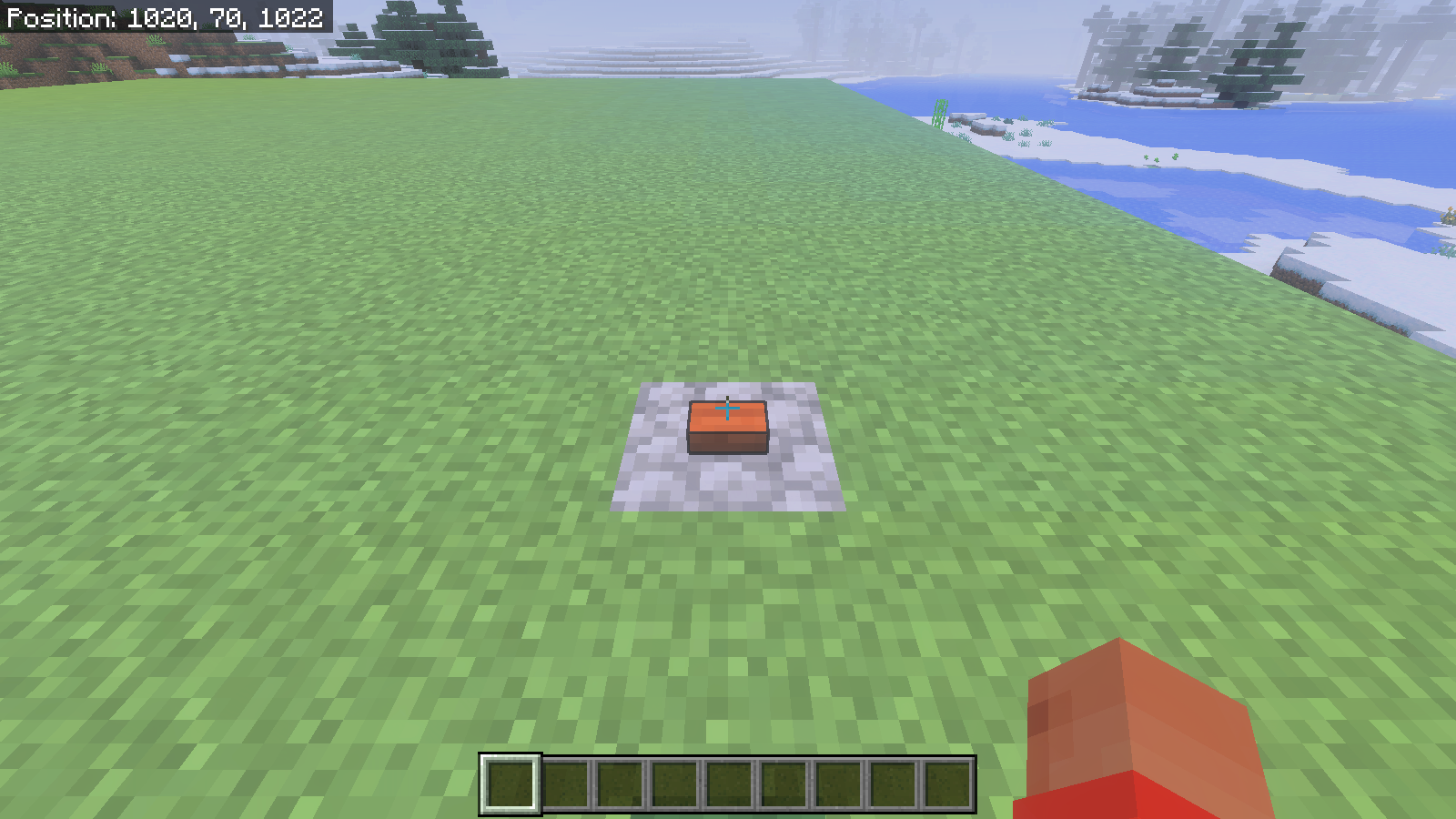 The sample’s cobblestone and button beside our flat demonstration platform in Bedrock.